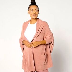 Barefoot dreams Shrug/poncho. Can wear either way. Has hidden sleeves. NWT